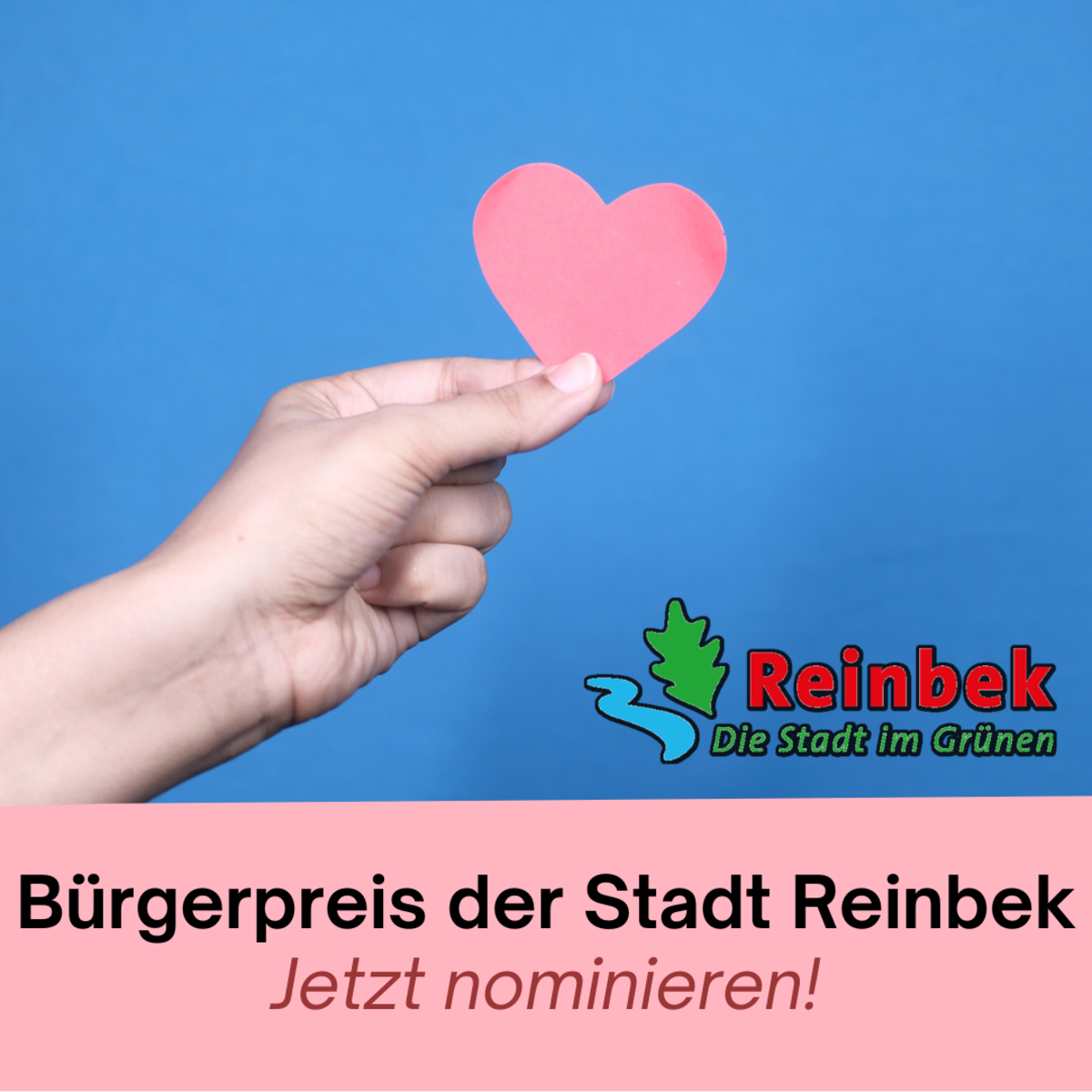 Hand mit einem Papierherz - Schriftzug: Stadt Reinbek Bürgerpreis - Jetzt nominieren